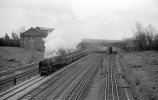 img2256 TM Neg Strip 55 92083 Ore hoppers down Bridge south of Kenton Stn 19 Apr 62 copyright ...jpg