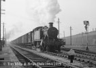 img024 TM Large Format. 6135 heads a rake of parcels van towards Padd Old Oak Dec 64 copyright...jpg