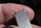 S4790009a Pockets in steel for pressing nuts on to bolts.jpg